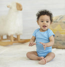 Baby wearing blue Gerber Onesies Bodysuit